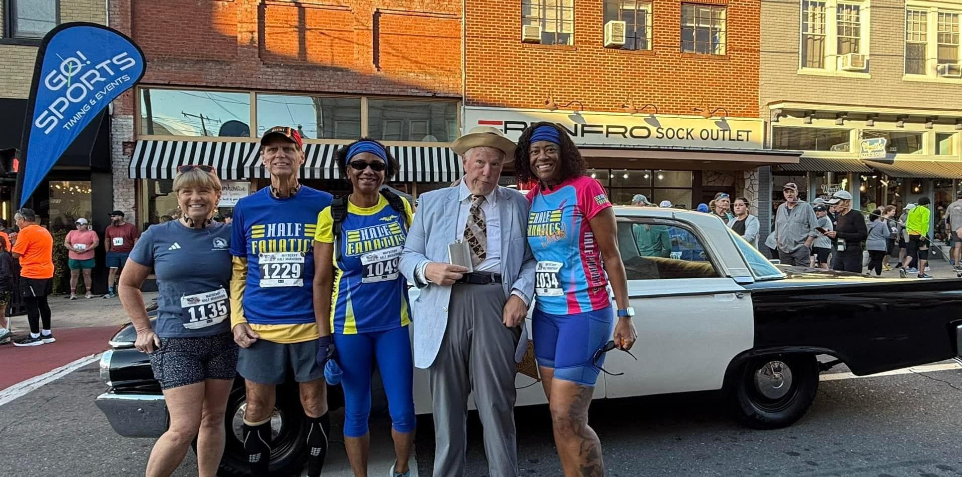 Otis and Women Runners in front of Mayberry Squad Car